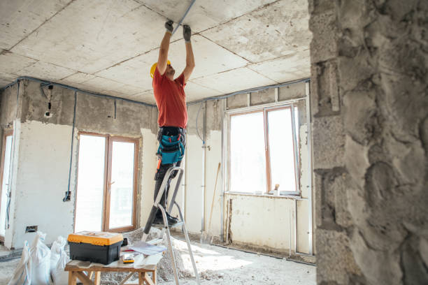Construction worker assembling roof