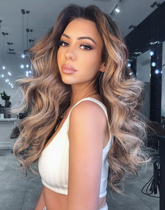 Long strong slightly curly blonde hair on brunette with dark skin tone
