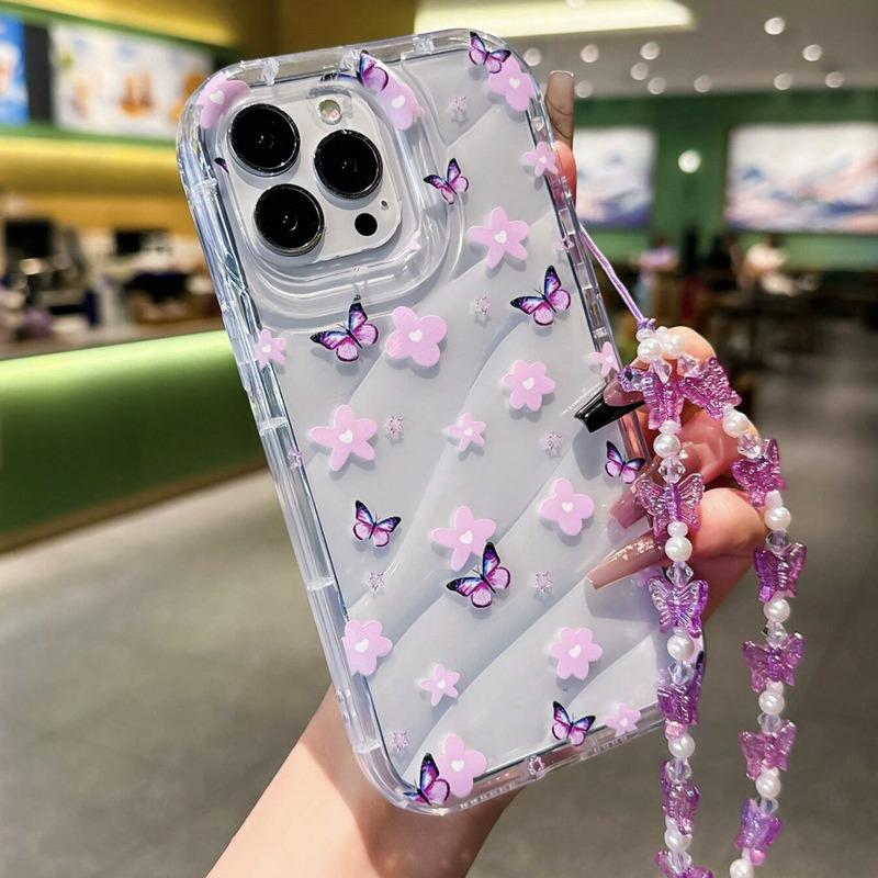 Foto de Funda transparente estampado floral. Incluye correa de mano.