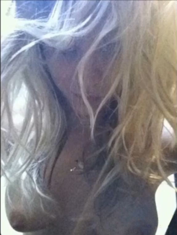 0821003037474-005-Kaley-Cuoco-topless-band-over-the-the-camera-thefappeningblog-com