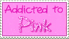 A sparkly pink stamp that says addicted to pink