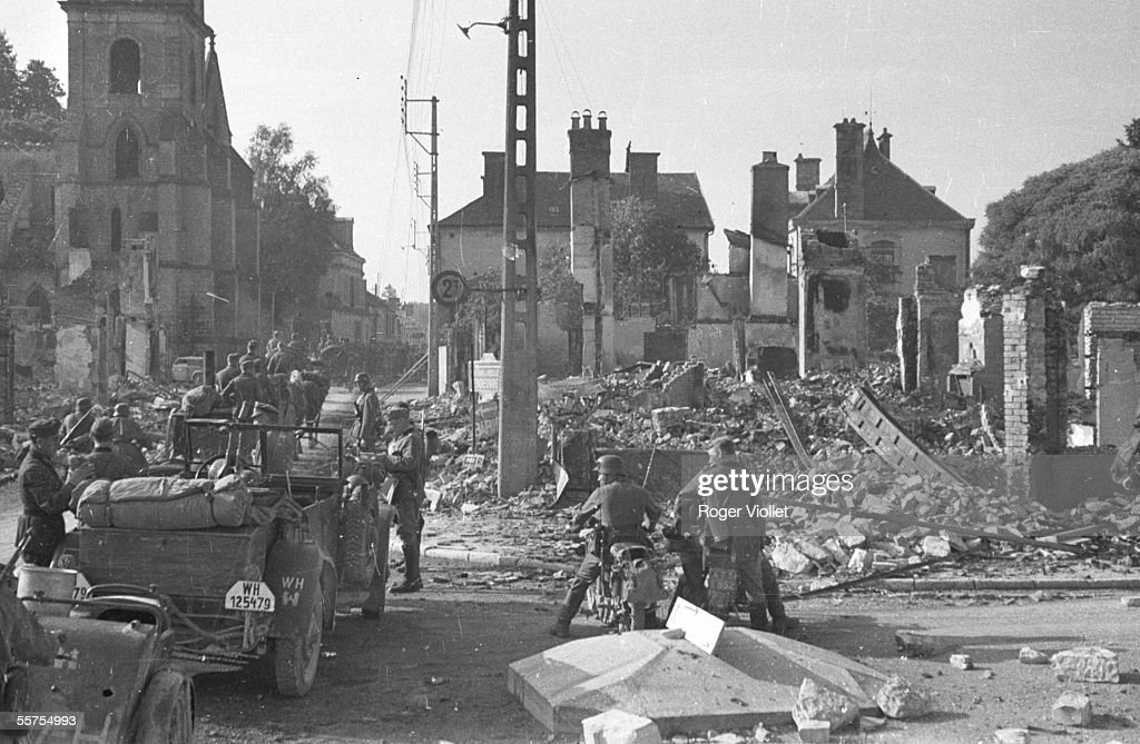 The campaign of France seen by a German soldier. Convoy crossing Brienne-le-Chateau (Aube) in ruins.