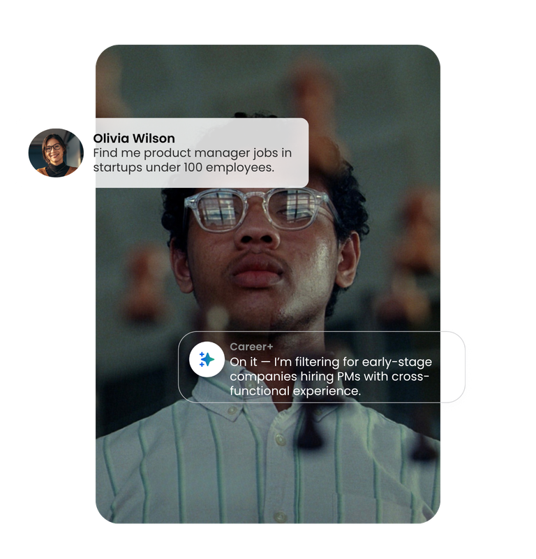 Two women posing at an office work area with warm color tones 1