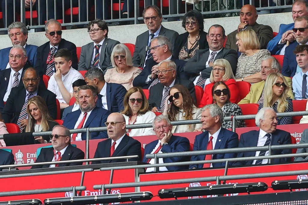 Avram Glazer in the stand together with the leadign board of MUFC