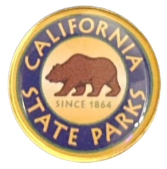 a glassy enamel pin of the california state parks' emblem
