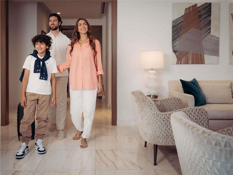 happy family enjoying the luxury inside Sofitel Dubai The Obelisk