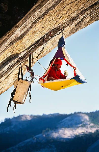 rock-climber-bivouaced-in-a-portaledge.jpg