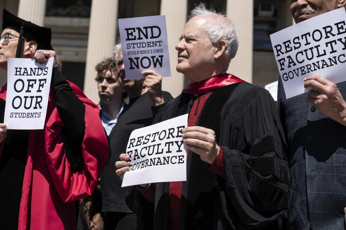 Students and faculty members on the campus of Columbia University