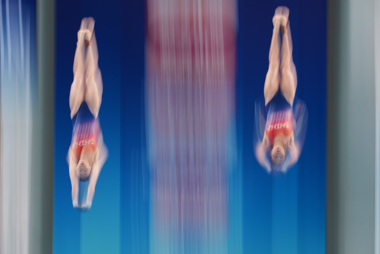 China s Chen Yuxi and Lu Wei compete in the women s 10 metre synchronised finals at the World Aquati