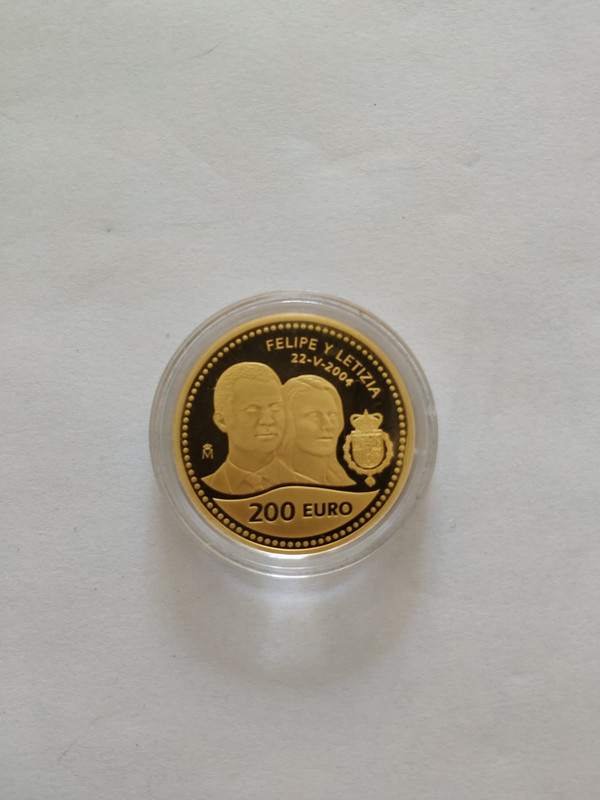 Dudas para limpiar esta moneda de oro conmemorativa IMG-20190714-WA0098