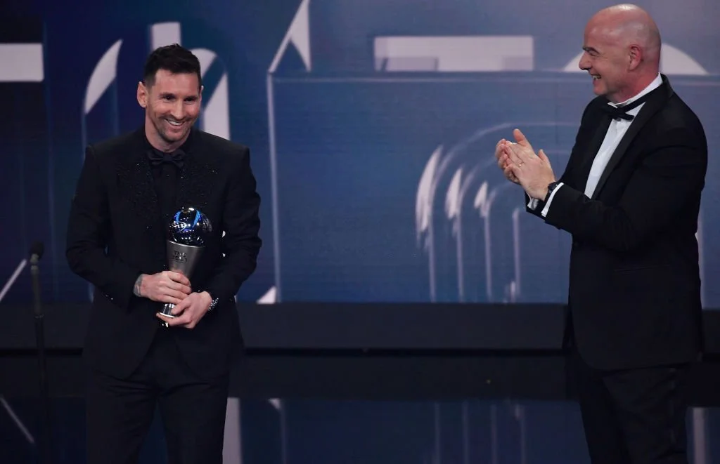 Lionel Messi taking the best FIFA player award