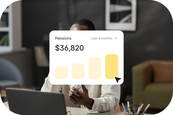 Two women coworkers smiling in warm toned office