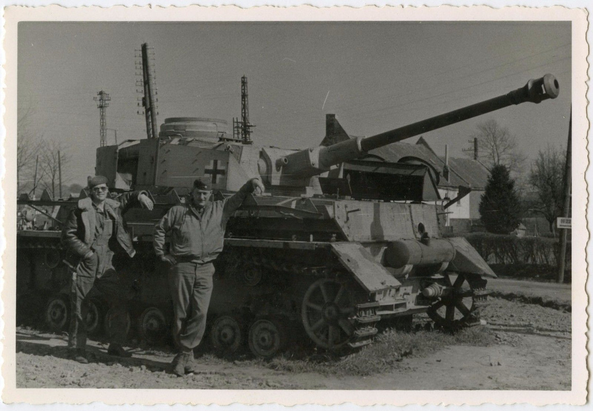 56TH FIGHTER GROUP POSE WITH CAPTURED NAZI GERMA