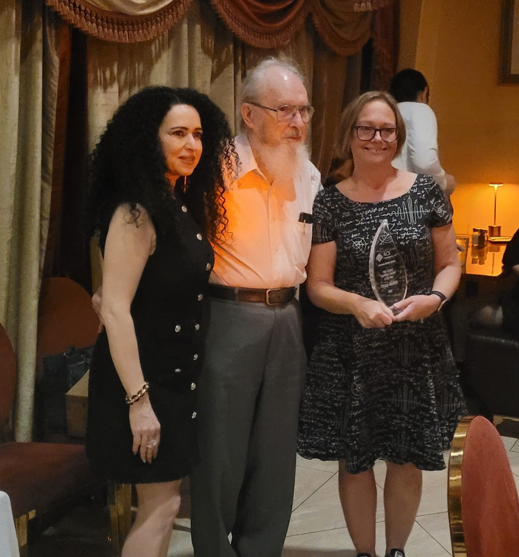 Tiffany Newton receiving 2025 HS Chemistry Teacher Award