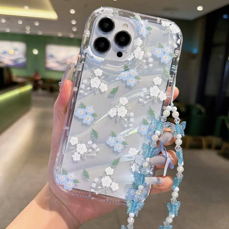 Foto de Funda transparente estampado floral. Incluye correa de mano.