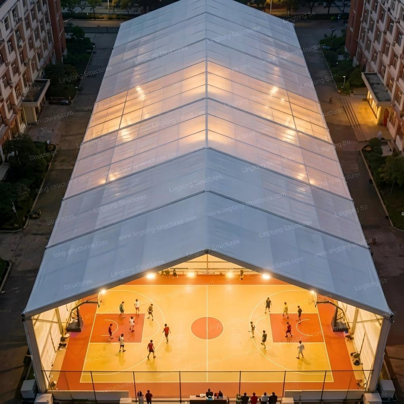 Aerial view of large sports tent structure for multi-purpose sports and events in park setting