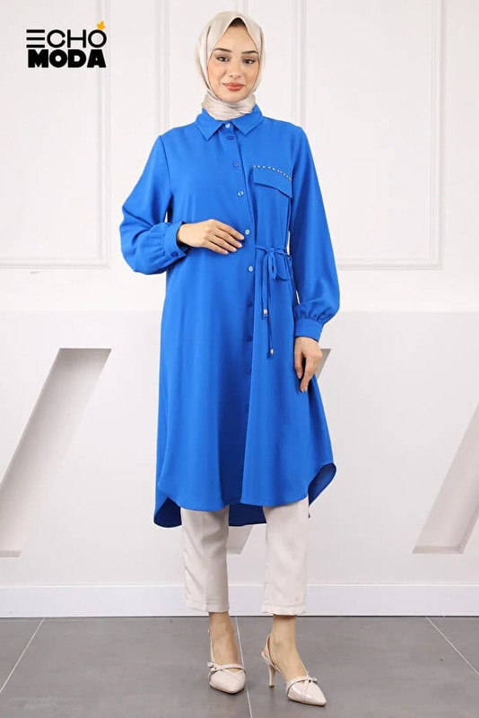 تونيكات طويلة بالبنطلون: إطلالة محتشمة بلمسة راقية تونيكات طويلة بالبنطلون: إطلالة محتشمة بلمسة راقية