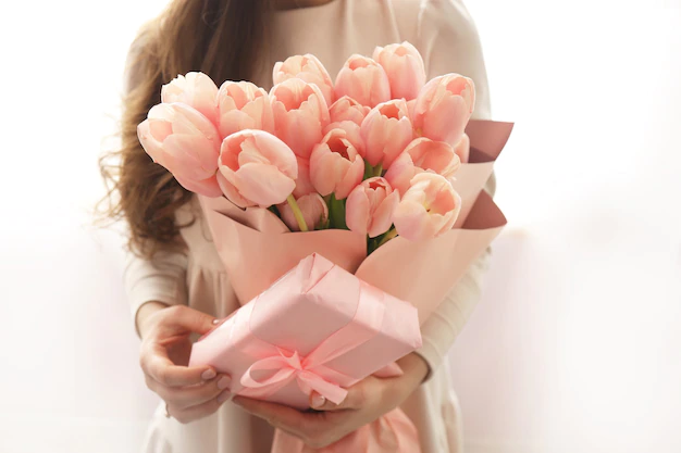 pink-pastel-color-tulips-woman-hand-young-beautiful-woman-holding-spring-bouquet-bunch-fresh-cut-spr.webp
