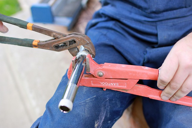Skilled worker performing plumbing maintenance