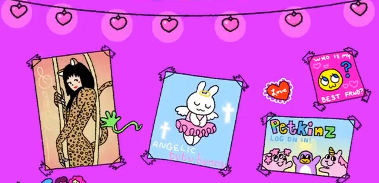 a pink wall of posters with heart string lights