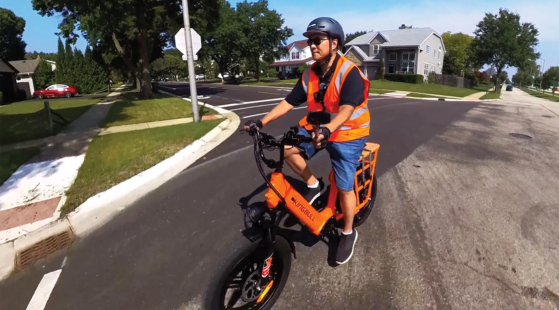 Rider carrying groceries on a Kingbull ebike cargo rack