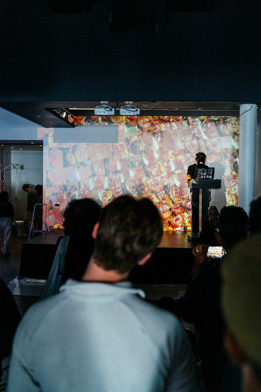Zane St. John performing 'slop.bar' at the closing reception