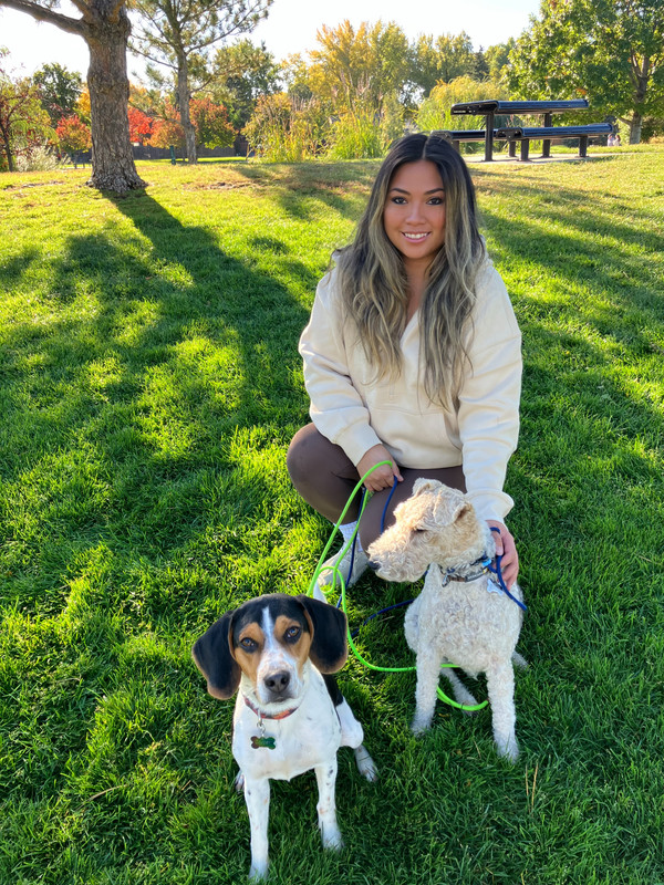 Keshia, owner of EnduroDog, with her two dogs