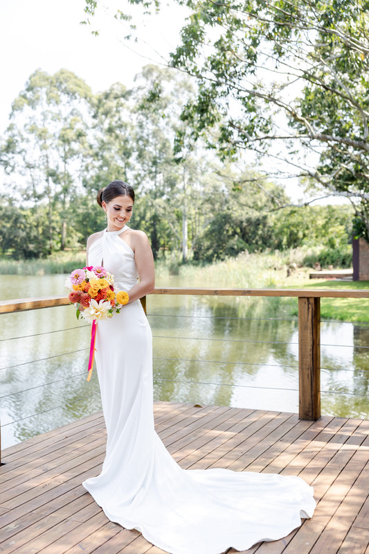 Elegant table decor with candles at an Arch & Arrow event.