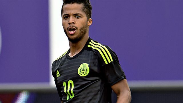 Giovani Dos Santos  2024 Marrone scuro capelli & afro stile dei capelli.
