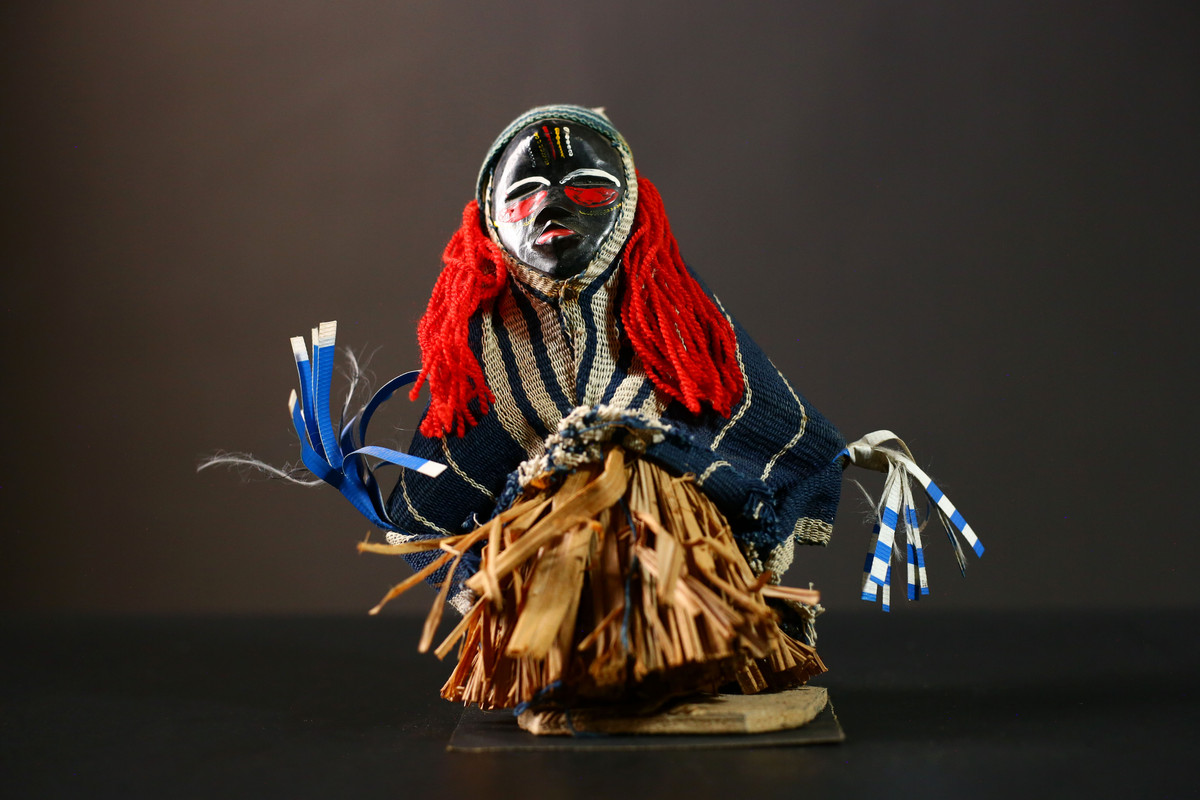 Back view showing textile and figure shape