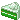 A pixel art gif of a matcha-flavored cake with sparkles above it