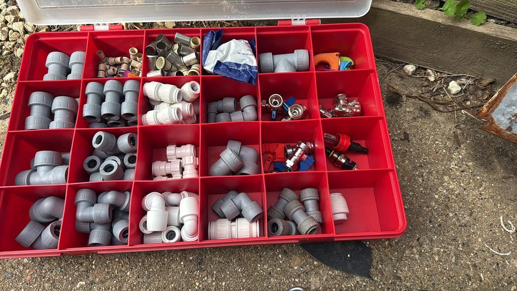 Organiser case full of push-fit plumbing fittings
