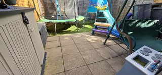 After shot of a clean garden patio in Hertfordshire thanks to my dog waste removal service.