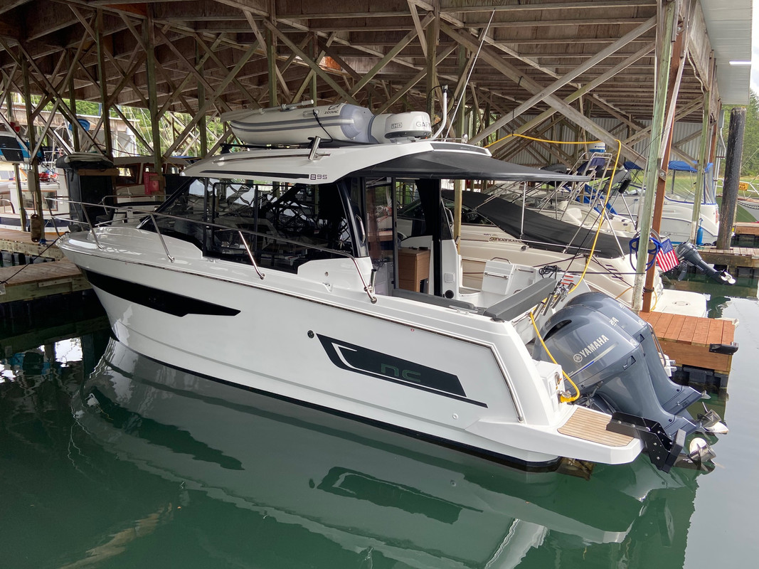 NC895 outboards not tilting out of the water all the way. Jeanneau