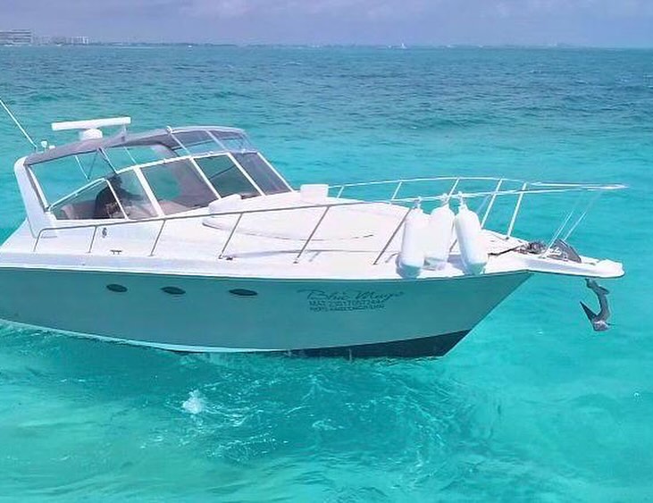 Blue Magic 38 ft yacht charter Cancun - Interior view showing luxury amenities and comfortable seating for 10 guests