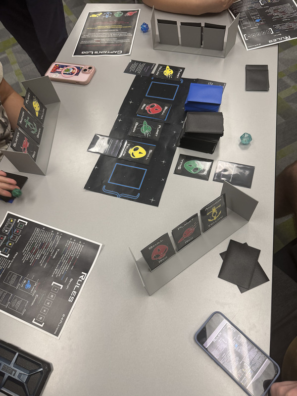Players seated around the Nebulooters table