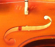 what does a violin soundpost do - soundpost visible through violin F-hole