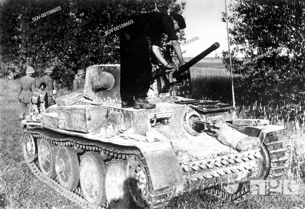 German Panzer 38 (t), on the Eastern Front, 1941... Tanker with a Panzer 38 (t) at Varena in Lithuan