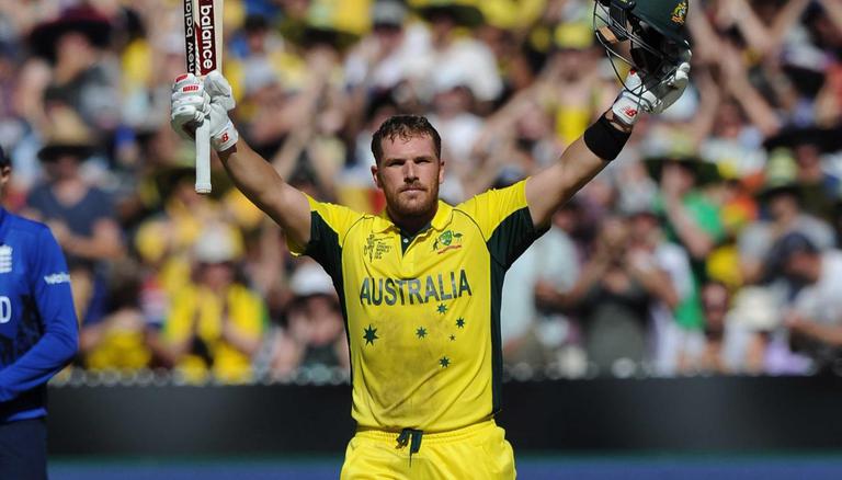 Finch celebrating his century