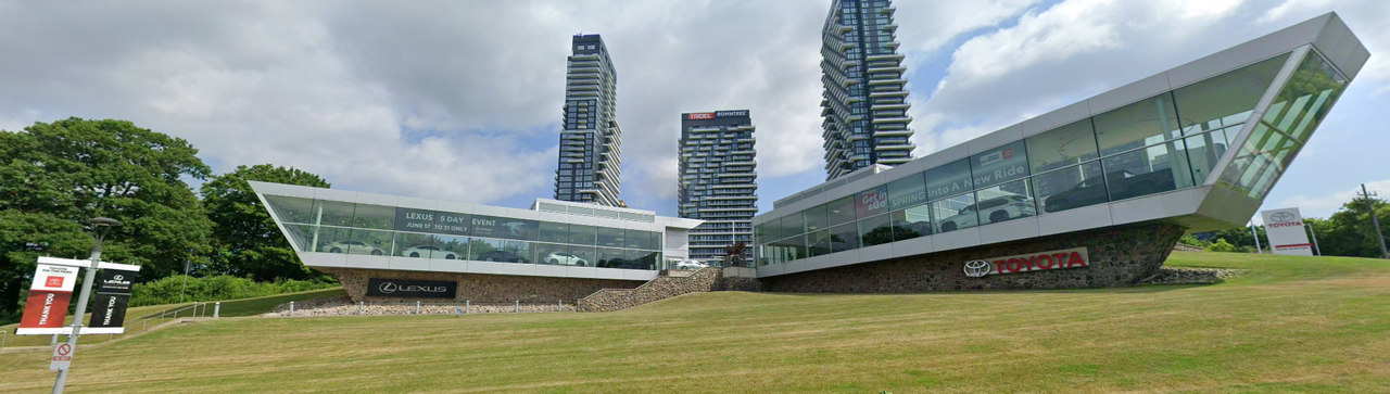 Dealership construction in the Greater Toronto Area — modern automotive showroom exterior with glass facade
