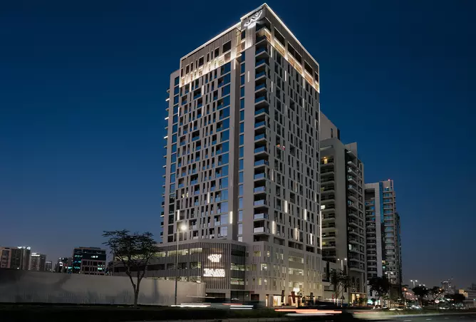 Canal Bay Distress Deal modern waterfront residential tower in Business Bay Dubai with sleek architecture overlooking Dubai Canal and premium urban surroundings