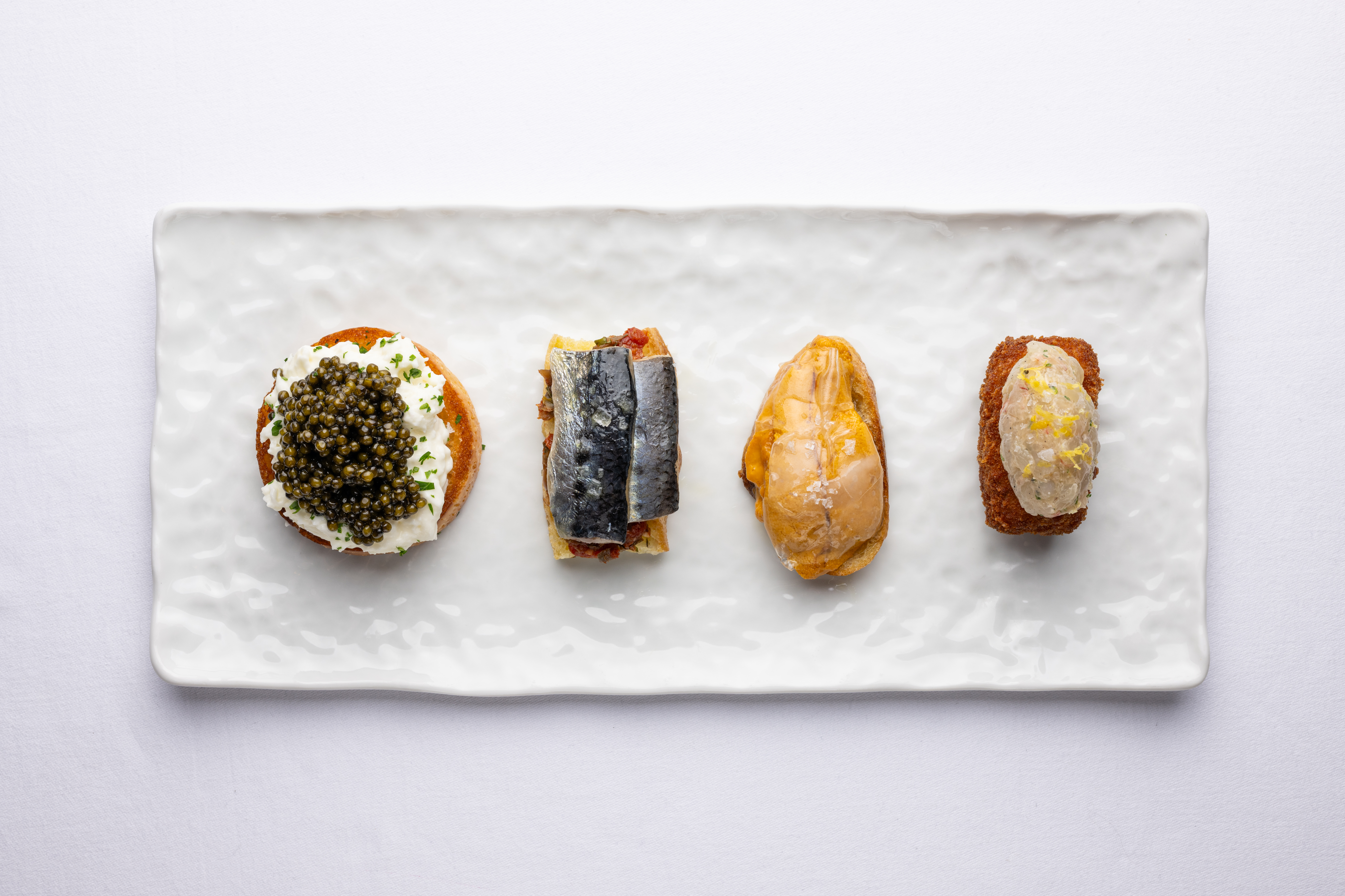 Fresh crudi preparations showcase Marea's commitment to pristine seafood