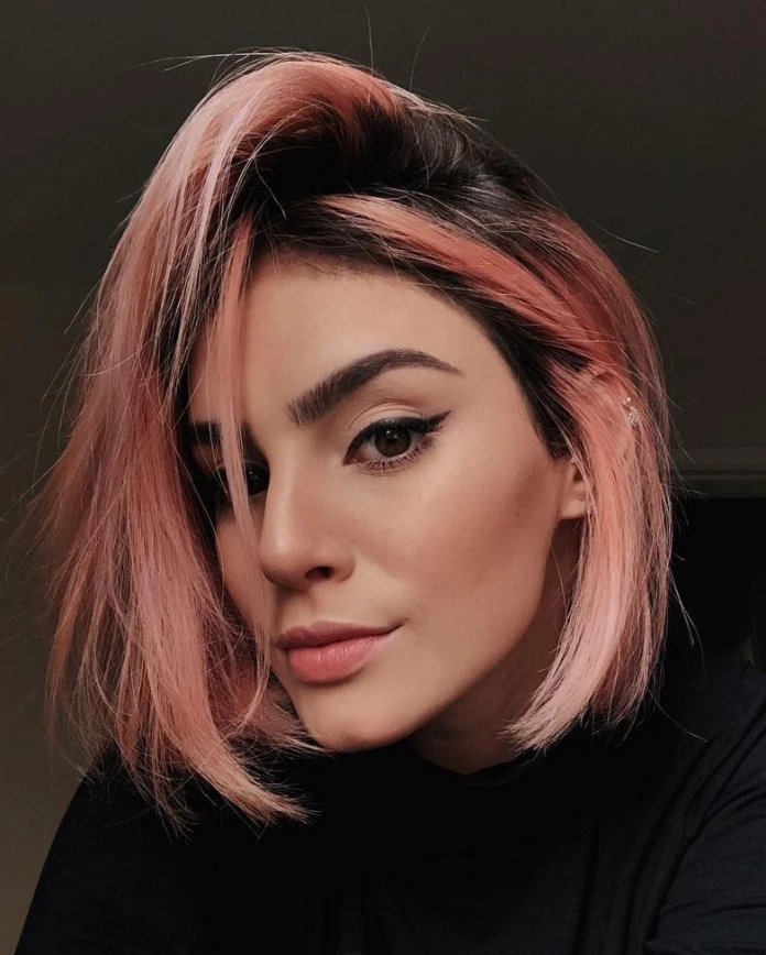 Black hair with strawberry highlights