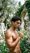 Man-smelling-flower-202604080719