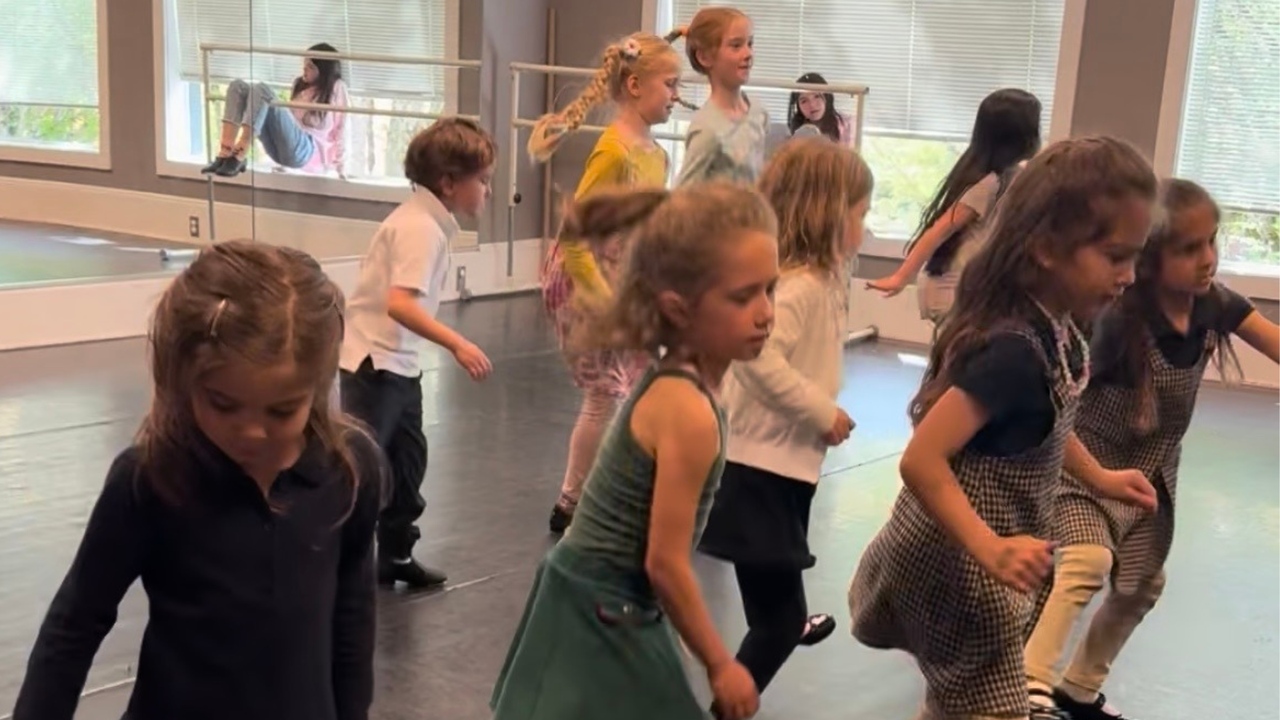 A large group of children tapdancing