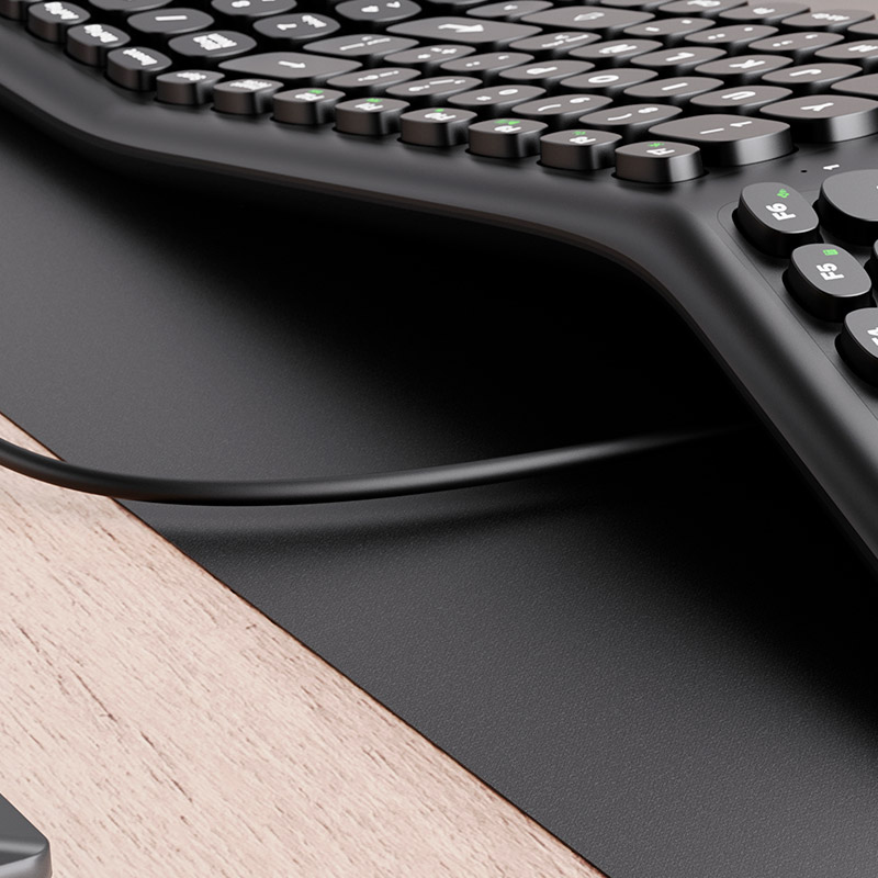 Vista lateral del teclado KlipXtreme, mostrando las patas ajustables para cambiar el ángulo de inclinación.