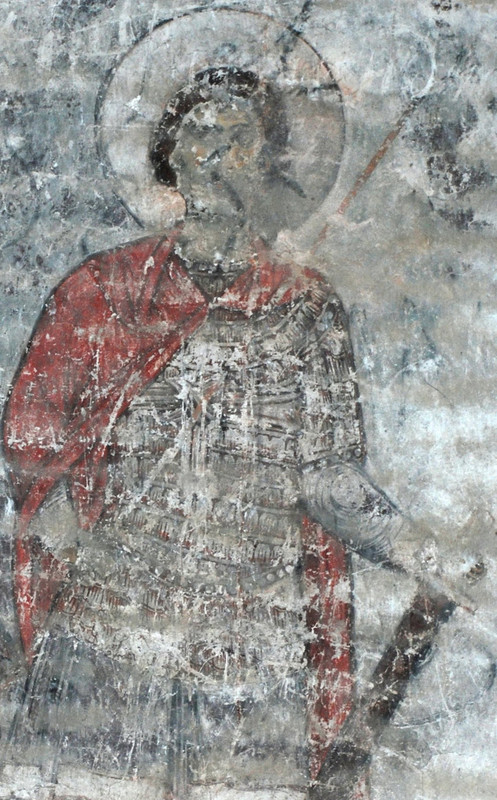 Shadows-under-the-plates-on-the-skirt-of-the-Warrior-Saint-in-Timotesubani-are-expressed