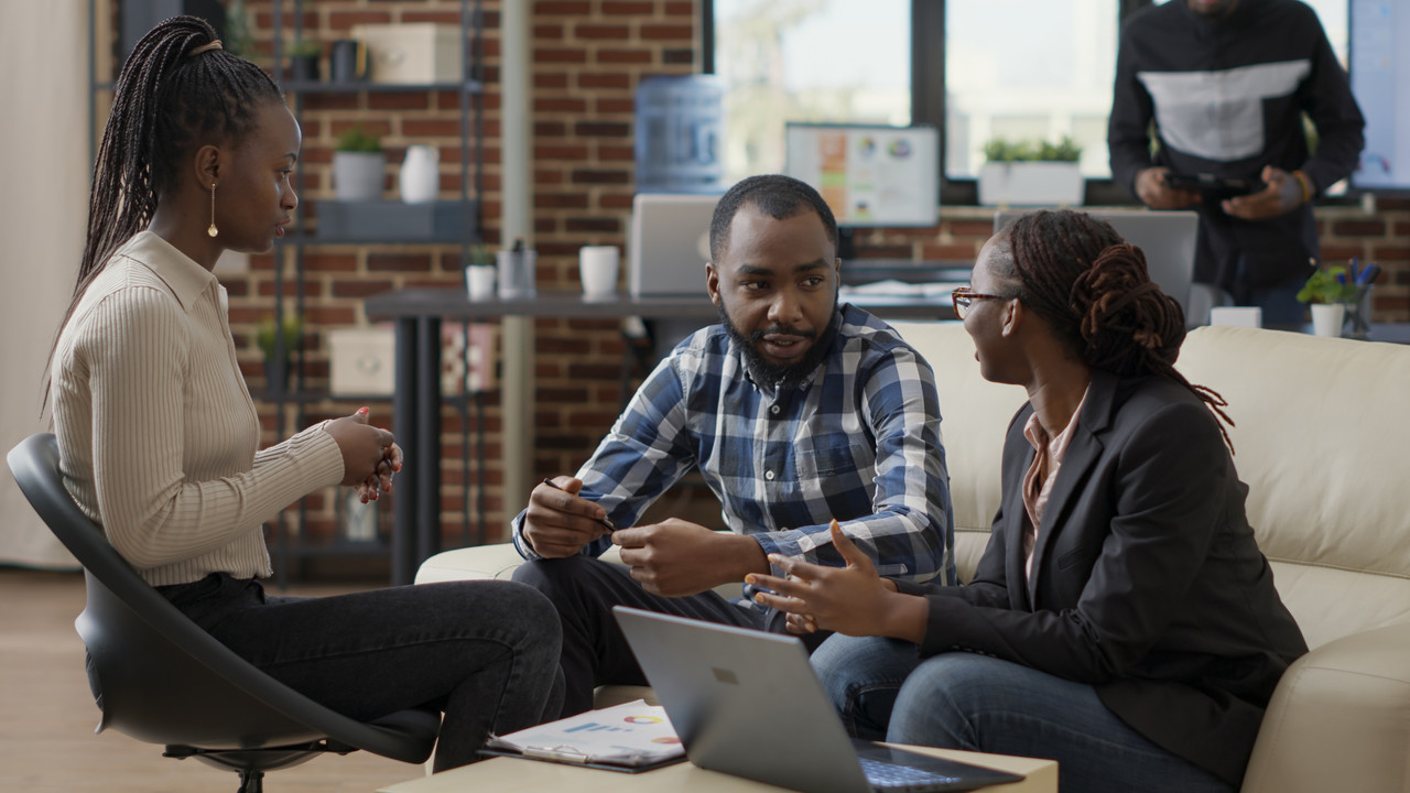 Business team collaborating on a financial strategy report