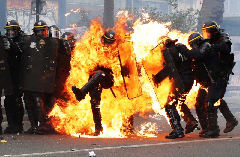 [Image: zakaria-abdelkafi-may-day-paris-protest-...e-fire.jpg]