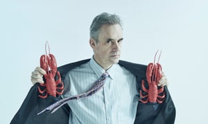 Jordan Peterson holding lobsters